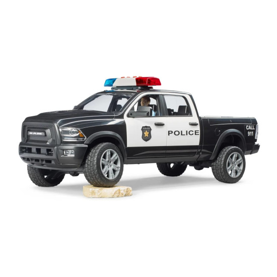 Policajný pick-up BRUDER RAM 2500 s nápadnou farebnou schémou a svetelným modulom.