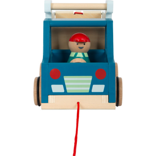 Drevený ťahací sklápač s vodičom pre autentickú hru.