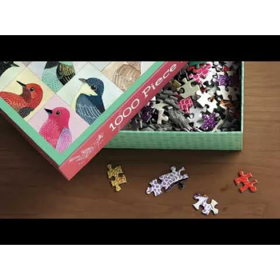 Fóliové puzzle od Michaela Storringsa predstavuje ducha hračkárske vianočné dielne.