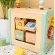 Drevená motorická kocka s aktivitami Louka Pastel Tooky Toy
