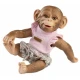 Realistická opička bábika Guca 32 cm v kvetovanom outfite – celovinylové telo