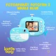 Detský fotoaparát Kiddoboo FotoFun 2 Whale Blue – modrý instantný foťák pre deti s okamžitou tlačou, farebnými fixkami a zábavnými rámikmi na fotografie.