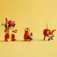 LEGO® Creator 3 v 1 (31145) s červeným drakom, fénixom a rybou, obsahuje polohovateľné zvieracie modely s farebnými detailmi, ideálne pre deti od 6 rokov na kreatívne stavanie a dobrodružné hry.