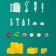 Dve minibábiky LEGO Friends, Autumn a veterinárka Gabriela, sa starajú o zvieratká na veterinárnej klinike. Sú obklopené figúrkami kozliatka, mačky a psa a používajú stôl, váhy, počítač a lampu na vyšetrenie. 