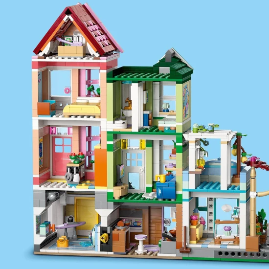 LEGO® Friends 42670 Apartmány a obchody Heartlake - tvorivá stavebnica s 9 postavami, pekárňou, keramickým štúdiom a ďalšími detailmi.