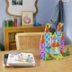 Magnetická stavebnica MAGNA-TILES Travel Set Deluxe – 55 mini dielikov v plechovom puzdre pre hru na cestách