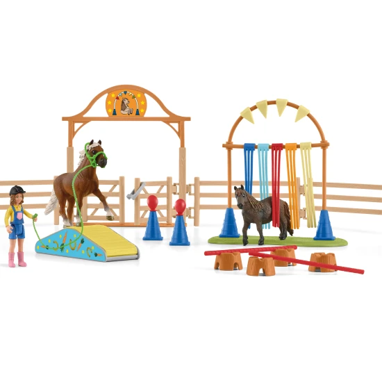 Poníky počas agility tréningu prekonávajú prekážky s láskyplným povzbudzovaním.