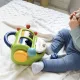 Vkladačka Aktivity pokladnička s pákou na ťahanie, s kolesom na otáčanie a veľkou rukoväťou na prenášanie, 