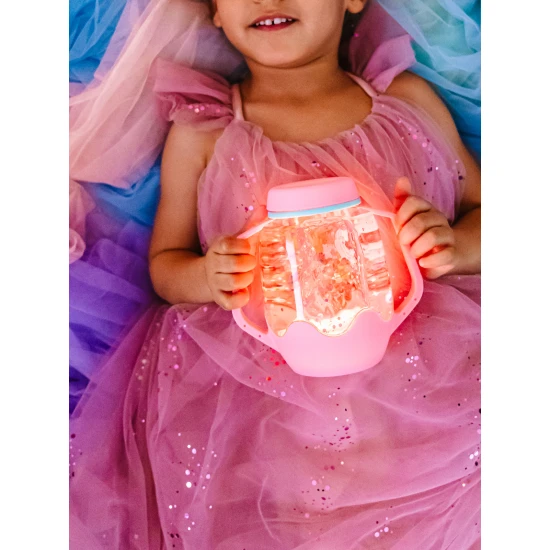 Glo Pals Senzorická fľaša Bubble gum: svietiaca hračka pre deti s ružovým dizajnom.