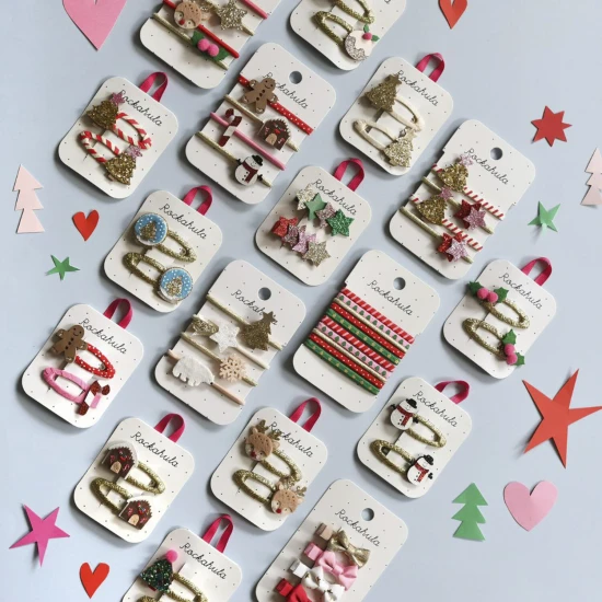 Gumičky do vlasov Vianoce – Zlaté, 4ks, trblietavé motívy stromček, hviezda, vločka, polárny medveď