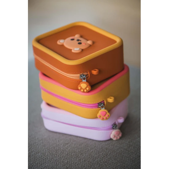 Silikónová taška pre bezpečné prenášanie fotoaparátu.