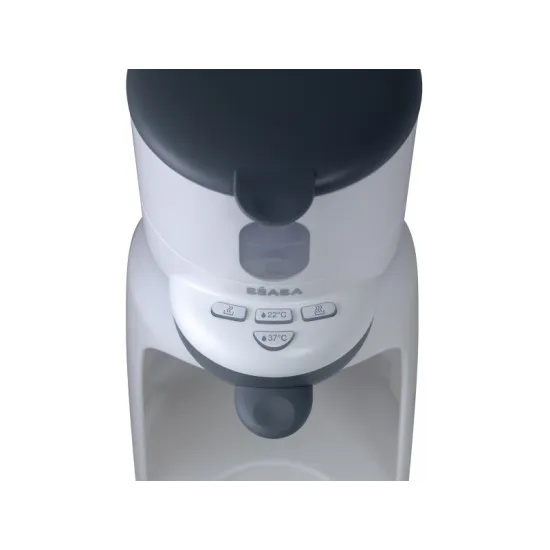 Prístroj na prípravu umelého mlieka s funkciou ohrievania fľaše s nápojom alebo pohára s príkrmom.